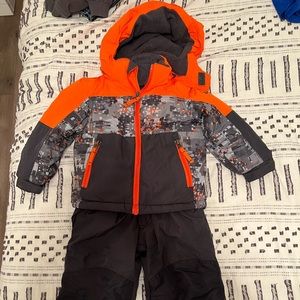 Toddler snow bibs and matching coat set.